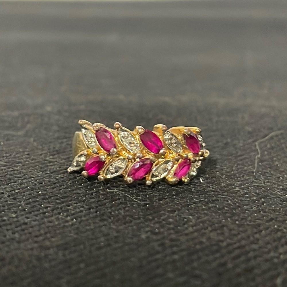 Large ring with two row of red and white gems